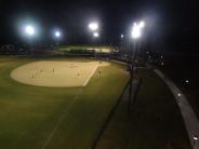 Baseball diamond lit at night