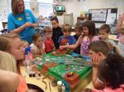 Children around enviroscape diorama